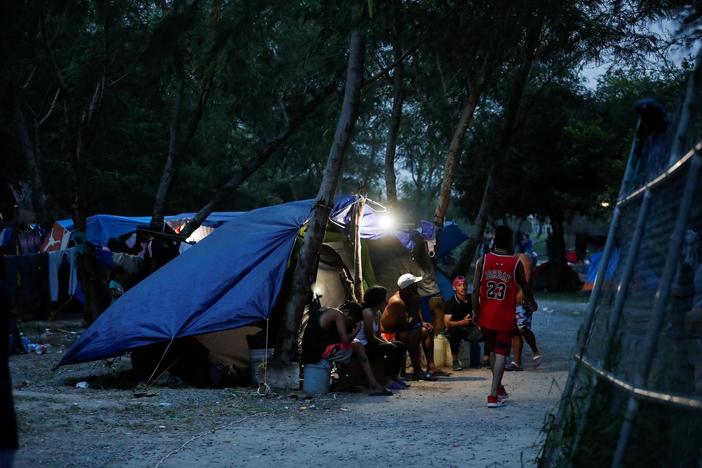 Migrants endure appalling conditions at border while waiting for chance to seek asylum