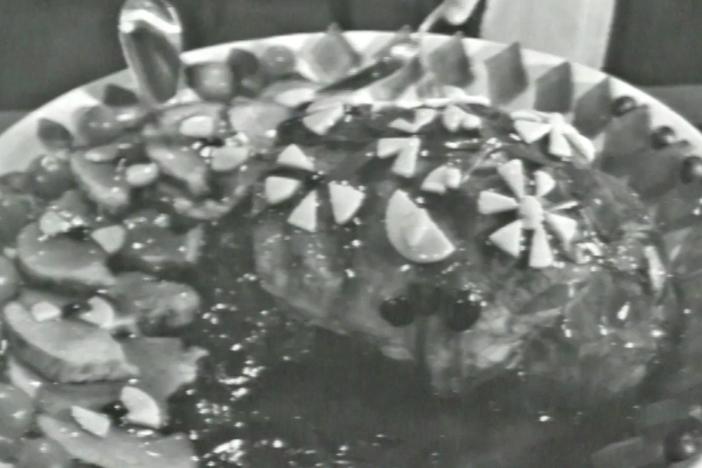 The French Chef's Julia Child demonstrates how to dress a turkey for a party.