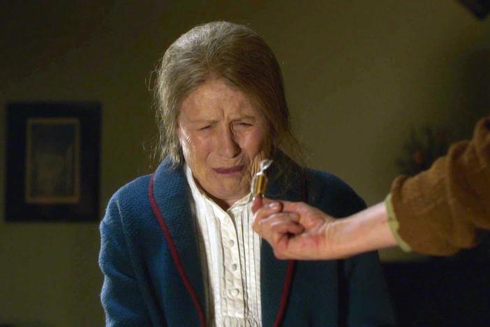 Nurse Crane convinces Sister Monica Joan to take her medicine.