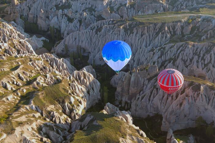 Soaring over Cappadocia in a hot-air balloon gives an unforgettable perspective.