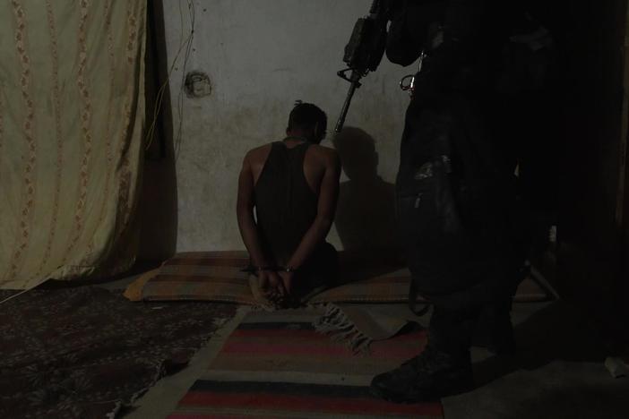 Watch Iraq's counterterrorism unit raid an ISIS agent's home