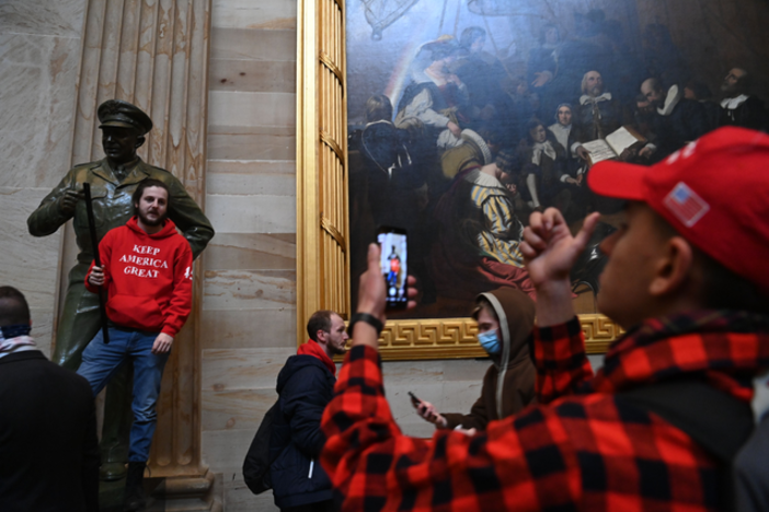 There’s an ongoing battle of words to describe Jan 6, 2021. Here’s why it matters