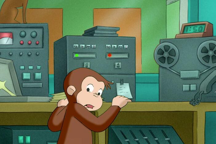 George finds the triangle button and saves the radio show.