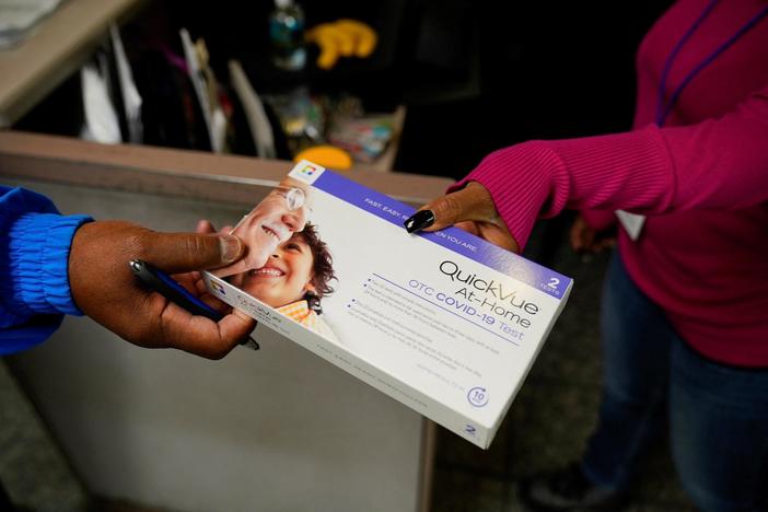 News Wrap: Biden administration says private insurers required to cover at-home tests