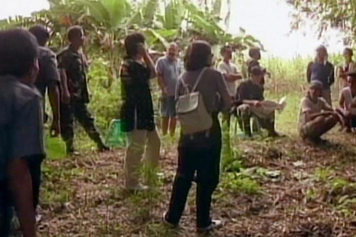 Authorities show up unannounced at the Larrañaga farm to search for evidence.