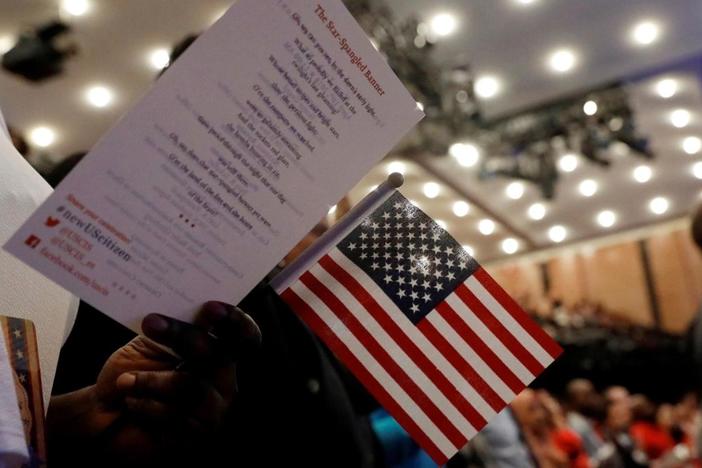 Newly naturalized Americans reflect on citizenship in a fraught political era