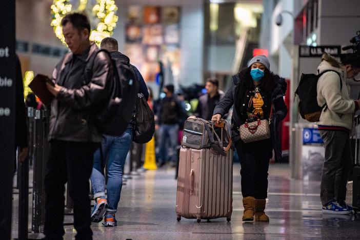 Winter storm creates treacherous holiday travel season