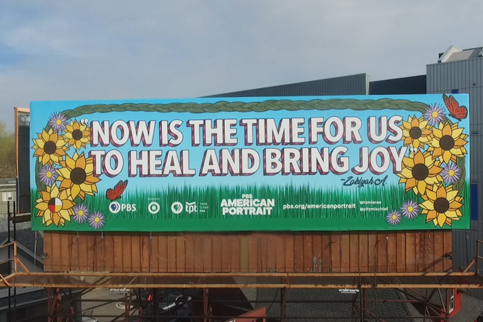 Learn about the concept, art and installation behind the mural in Minneapolis.