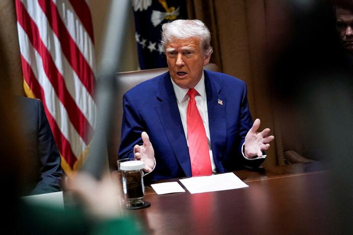 Trump defends enormous tariffs on China as markets take another dip