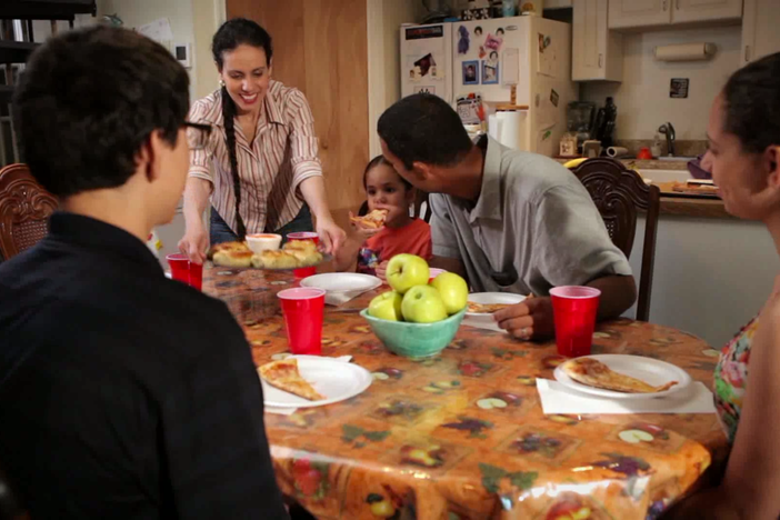 The Cruz family watches PBS kids together.