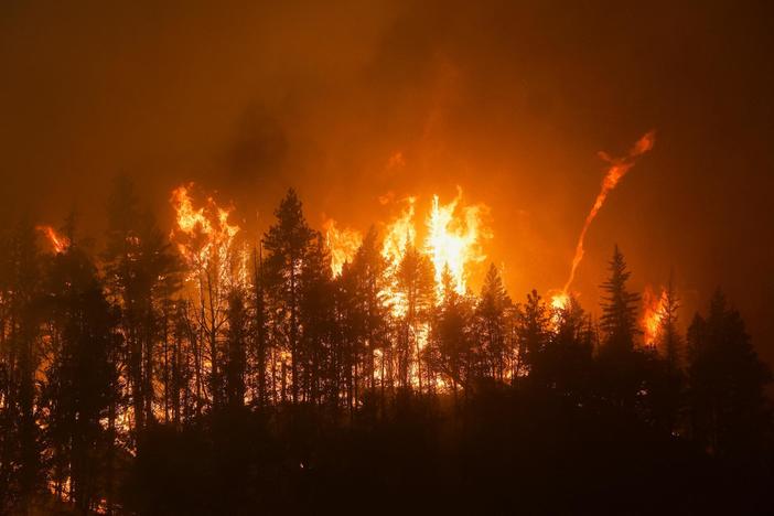 News Wrap: Destructive Western wildfires force evacuations