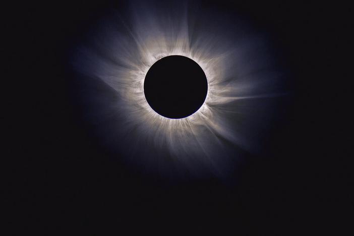 Explore the spectacular cosmic phenomenon of a total solar eclipse.