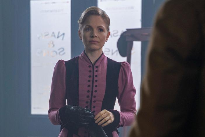 Eliza arrives at work to find a familiar face waiting for her.