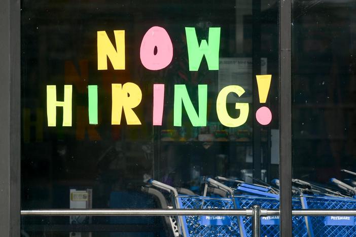 News Wrap: Labor report shows economy added 199,000 jobs, unemployment drops to 3.7%