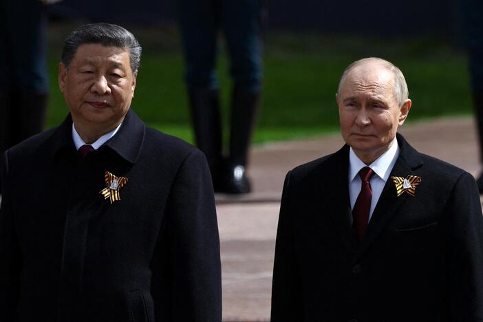 Putin uses Russia’s WWII celebration to strengthen alliance with China