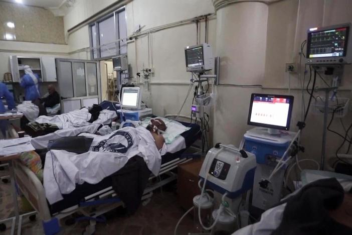 After 10 years of civil war, COVID-19 takes hold in Syrian opposition's last stronghold