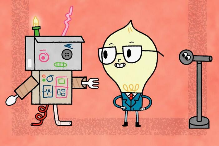 Watt Light presents a robot he's built at a Town Hall meeting.