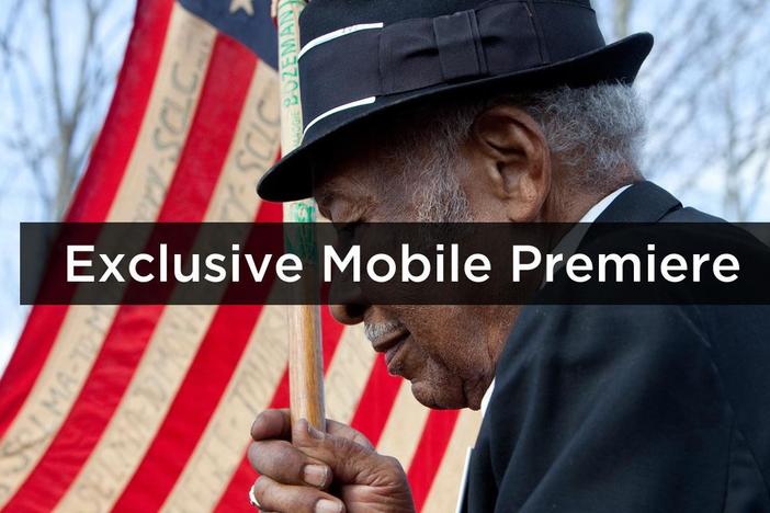 An Alabama barber celebrates the election of the first black president.