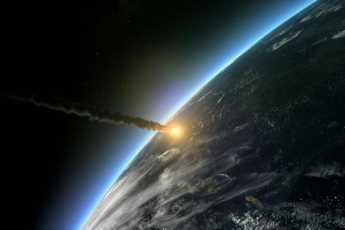 Experts drill into the impact crater of an asteroid that created a worldwide cataclysm.