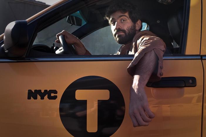 DRIVERS WANTED reveals the eclectic community inhabiting a taxi garage in Queens, NY.