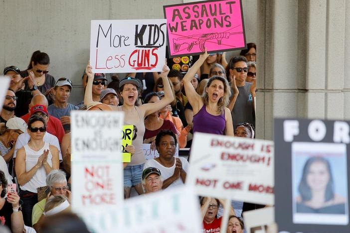 How do gun laws affect mass shootings?
