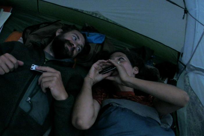 Isaac and Bjornen play harmonica deep in the Frank Church-River of No Return wilderness.