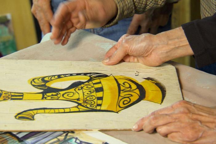 Watch this clip to see examples of Frank Zappa's artwork.