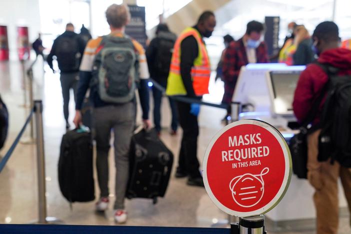 News Wrap: CDC extends COVID mask mandate for air travel, public transit