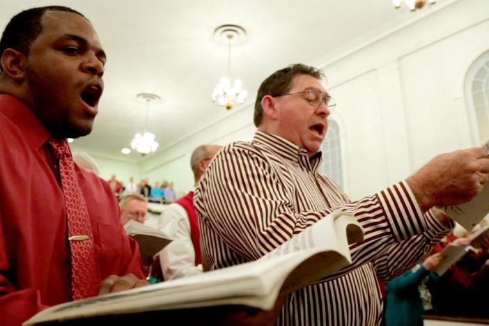 A congregation invites the community to join the choir and reflect on the Christmas season