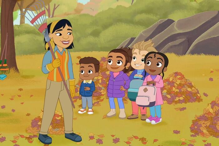 Alma and friends gather piles of leaves to jump in and then take them home to play later.