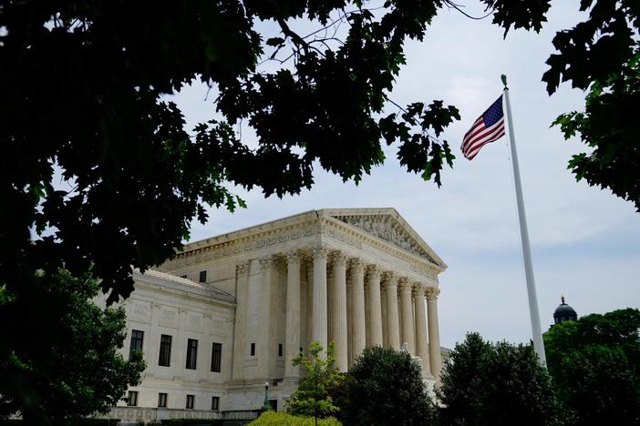 News Wrap: Supreme Court sides with cheerleader kicked off squad for social media post