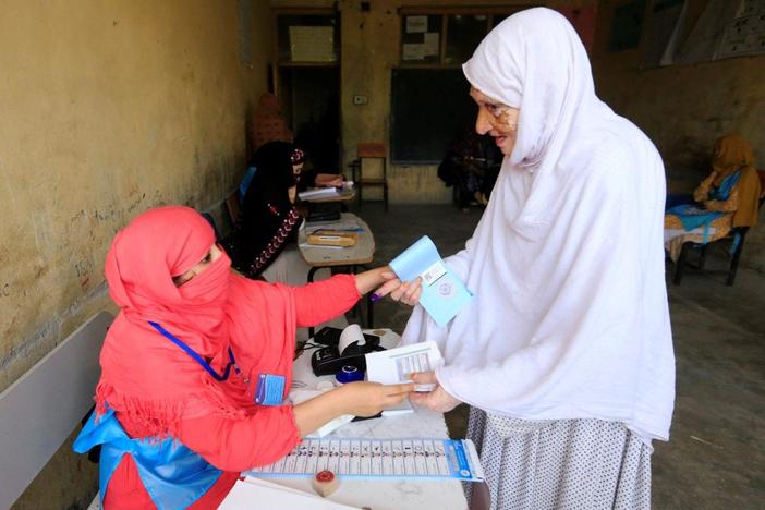 Afghans vote amid fears of violence and alleged irregularities