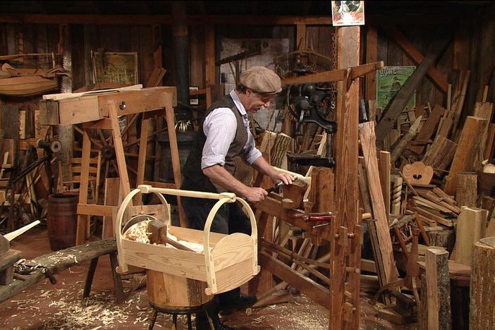 Roy completes the rocking cradle with pine sides and rockers.
