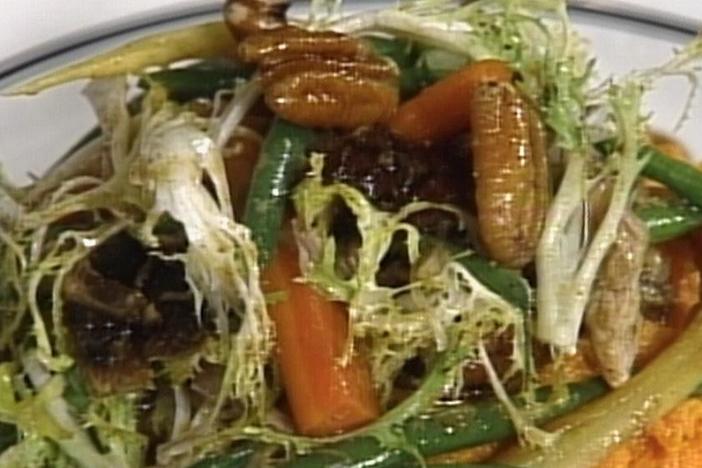 Chef Dean Fearing prepares a mollasses-glazed duck salad.