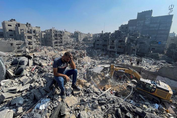 Some civilians trapped in Gaza allowed to cross into Egypt as Israeli airstrikes continue