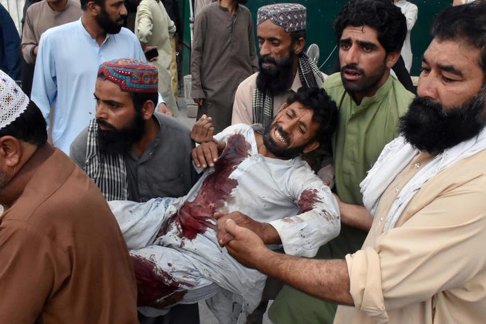 News Wrap: ISIS claims responsibility for deadly Pakistan election rally bombings