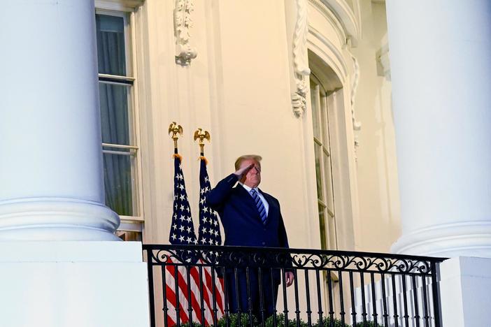 Trump urges Americans not to fear virus that has killed over 210,000