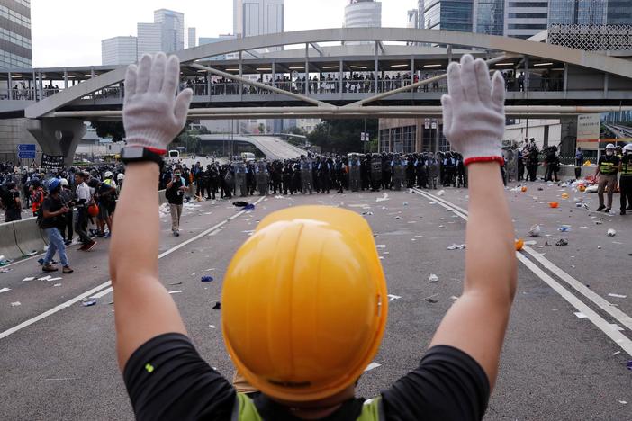 Mass protests over Hong Kong extradition law turn violent