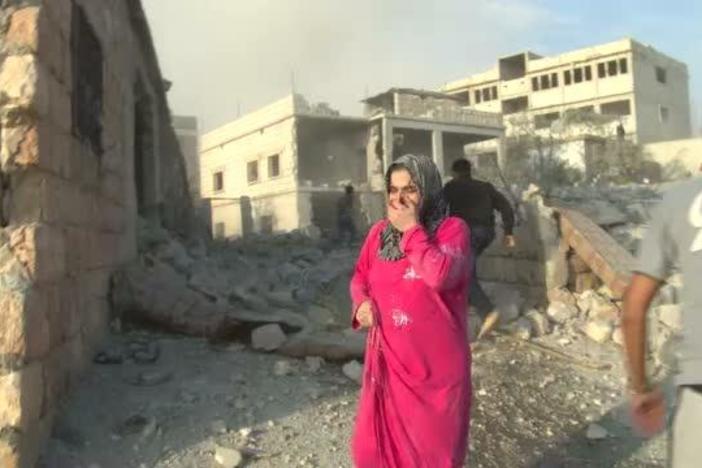 A rare portrait of the immediate aftermath of Syrian air strikes on civilian neighborhoods