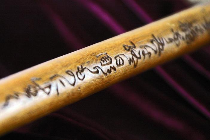 Can the characters on this cane unlock a family secret from the WWII internment camps?