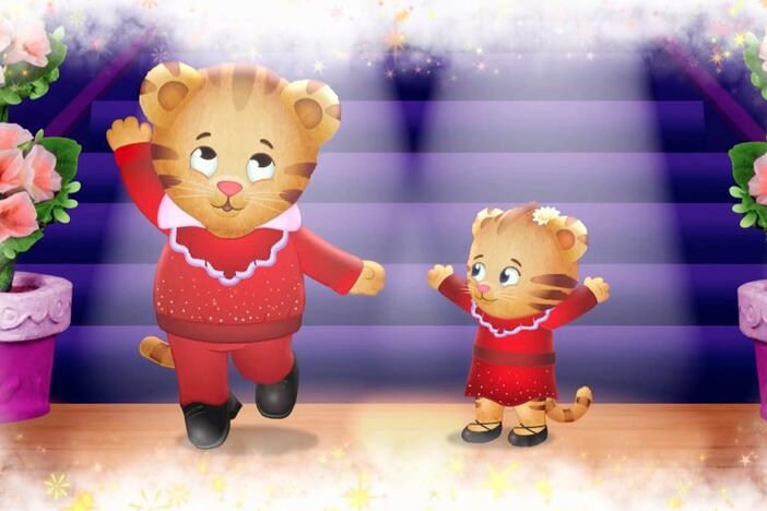 Daniel makes believe that he and Margaret are dancers in a real dance show. 