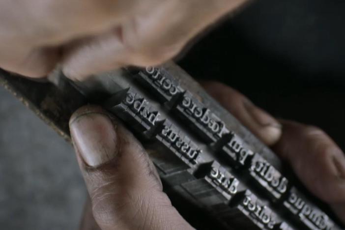 Watch how a printing press works.