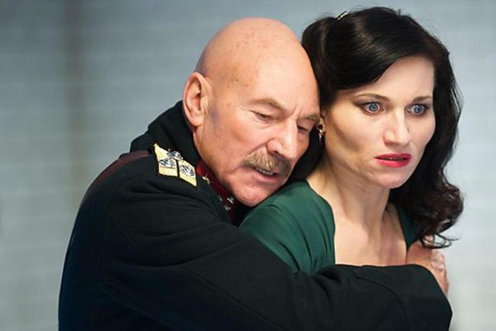 Banquo's ghost haunts Macbeth (Sir Patrick Stewart) at a dinner party.