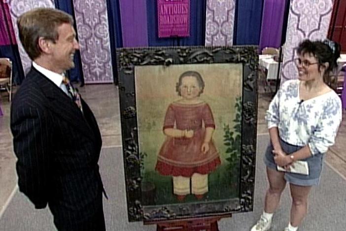 Carl Crossman appraises a ca. 1840 folk art portrait.