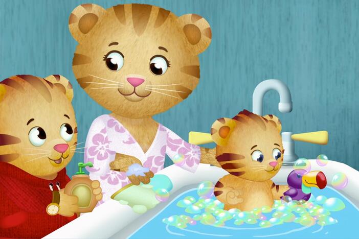 Daniel helps with Margaret's bathtime. 