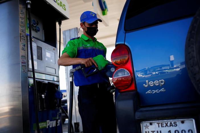 News Wrap: Nation's average gas price drops below $4 a gallon