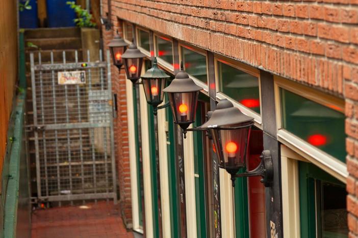 Amsterdam’s creative approach to marijuana use and prostitution: legalize and regulate it.