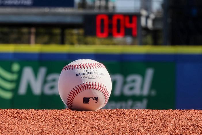 Baseball's new pitch clock speeds up the game, draws mixed reaction from players and fans