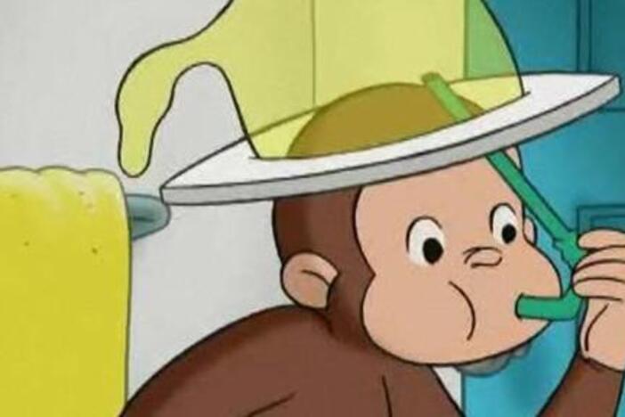 George tries to find a new hat for the Man in the Yellow Hat.