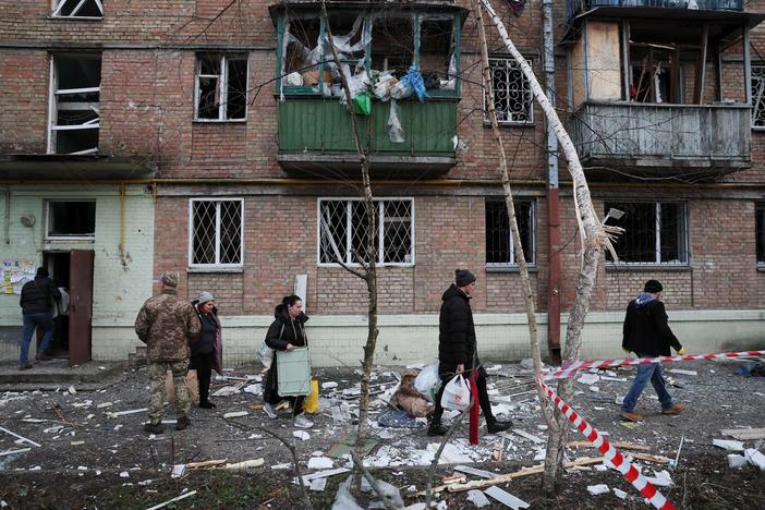 News Wrap: Russian missiles destroy homes and cars in Kyiv